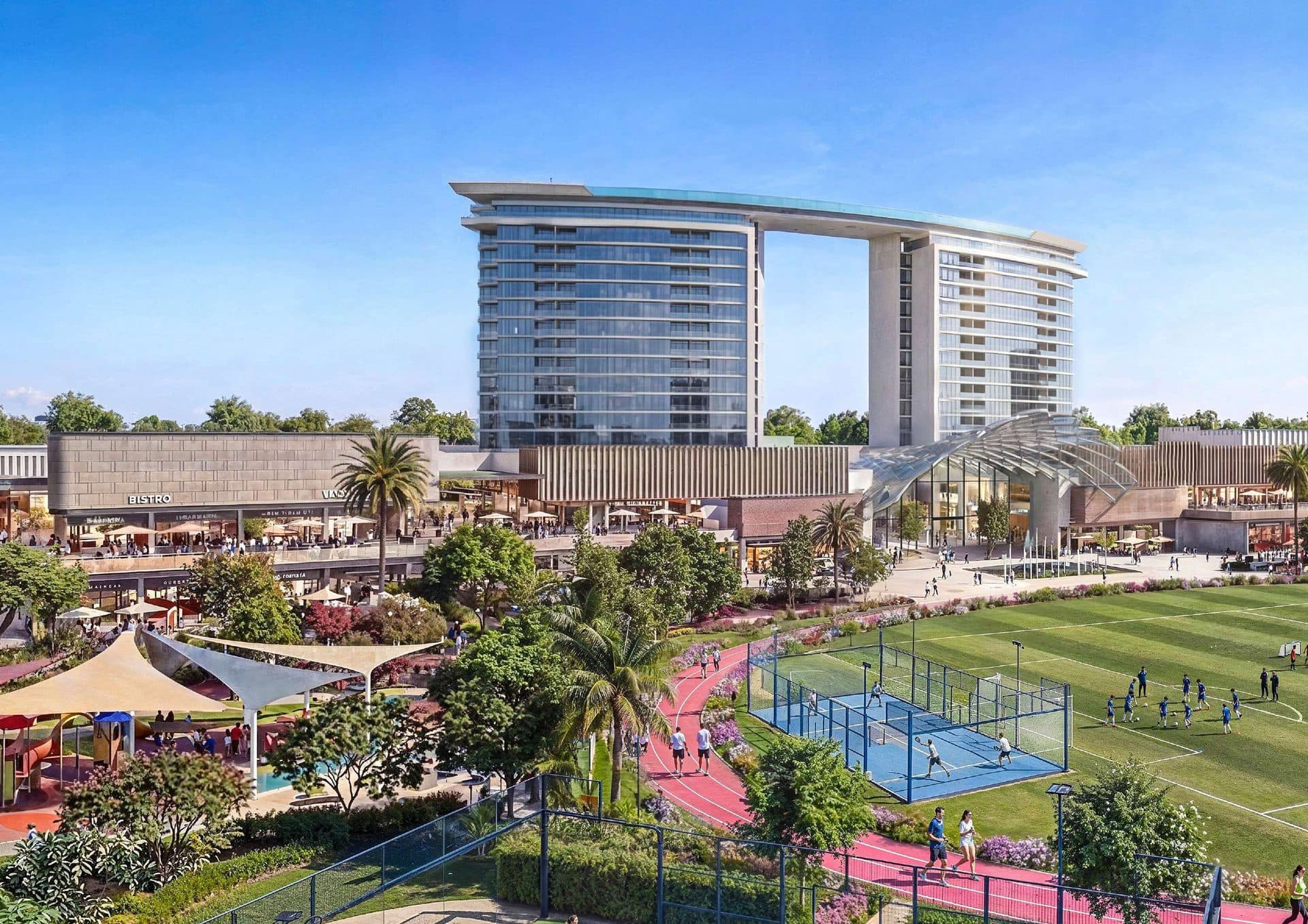 Aerial rendering of the retail plaza, running track, padel courts and sports field at Sobha Sanctuary